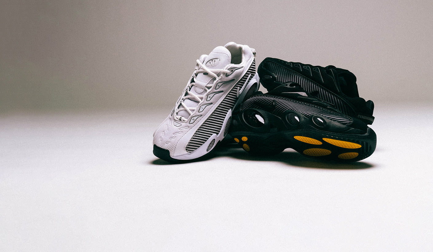 Nike x NOCTA Glide sneakers, one pair in white with black details and one pair in black with yellow accents, styled minimally on a light background.