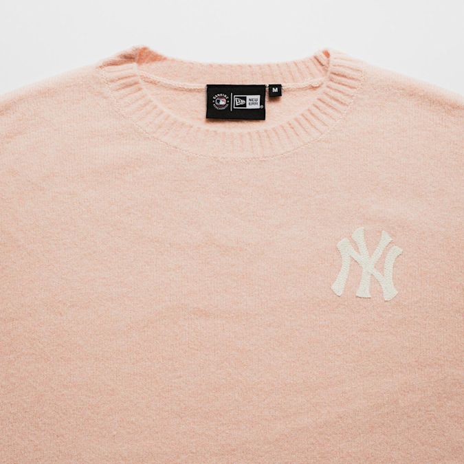 Flat lay of four jackets in different styles and colors: a black puffer jacket with Nike ACG logo, a dark green corduroy Carhartt jacket, a brown Carhartt hooded work jacket, and a black hooded jacket.