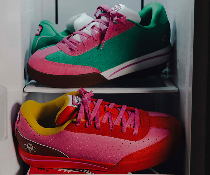 Two pairs of Reebok x BBC Ice Cream Boardflip sneakers displayed on shelves, featuring bold colorblocking with pink, green, and red uppers, contrasting laces, and playful branding details.
