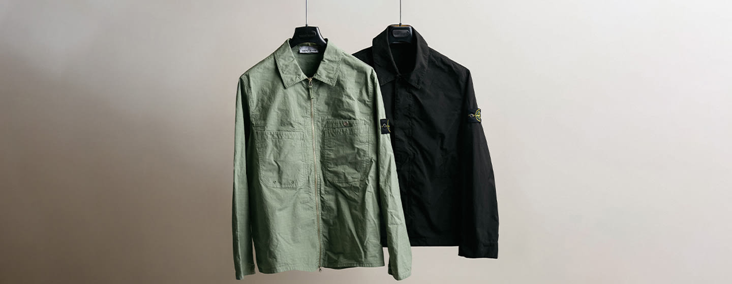 green and black stone island jackets