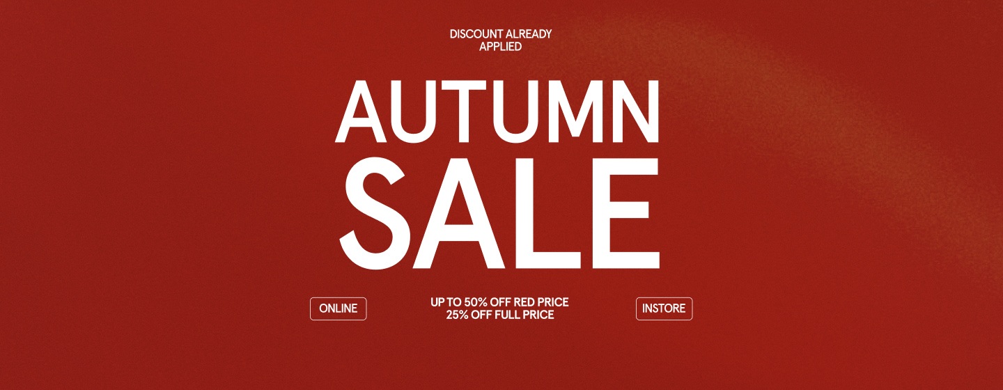 "Autumn sale banner with the text 'AUTUMN SALE' in bold white font on a red background. The banner also includes the message 'DISCOUNT ALREADY APPLIED' and promotions: 'UP TO 50% OFF RED PRICE' and '25% OFF FULL PRICE.' At the bottom, there are buttons labeled 'ONLINE' and 'INSTORE.'"