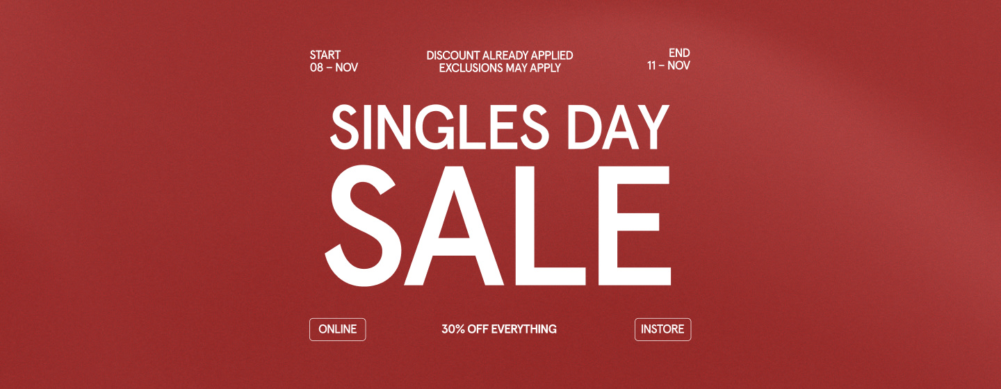 Horizontal header banner for Singles Day Sale with a deep red background. Large white text in the center reads ‘Singles Day Sale’. Smaller text at the top says ‘Start 08 – Nov’ on the left, ‘Discount already applied, exclusions may apply’ in the middle, and ‘End 11 – Nov’ on the right. At the bottom, buttons labeled ‘Online’ and ‘Instore’ flank the phrase ‘30% off everything’.