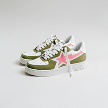 The second image showcases a BAPE STA in white and olive green, highlighted by a large pink star logo and subtle branding details.