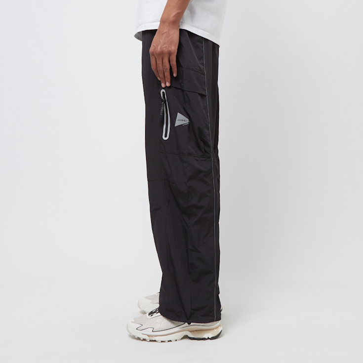 Buy Gramicci x And Wander Patchwork Wind Pant in black