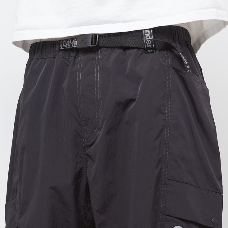 Buy Gramicci x And Wander Patchwork Wind Pant in black
