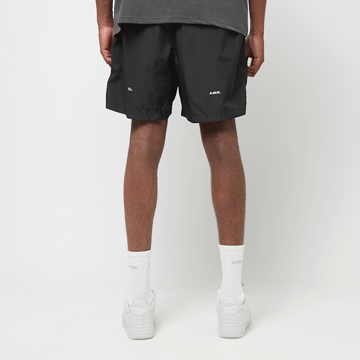Buy Nike x Nocta NRG Woven Shorts in black | FN8194-010 at