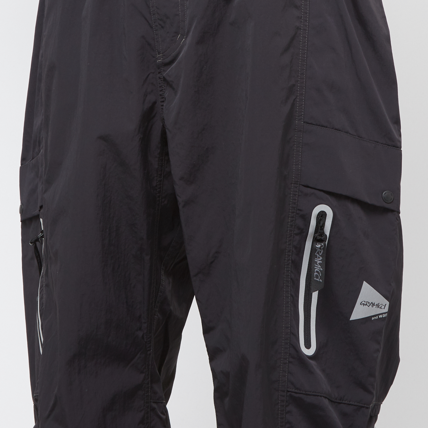 Buy Gramicci x And Wander Patchwork Wind Pant in black