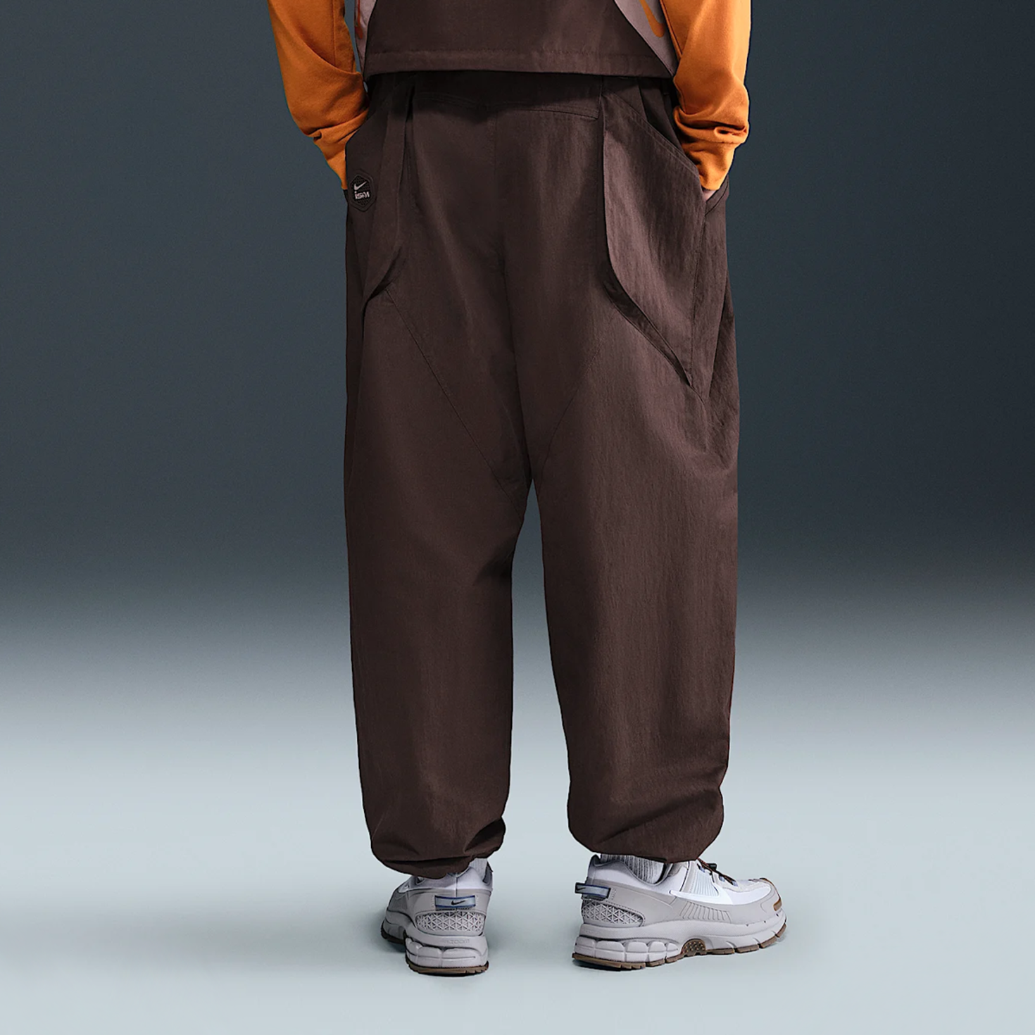 Buy Nike ISPA Adapt Wrap Pant in bruin | HF6404-227 at solebox