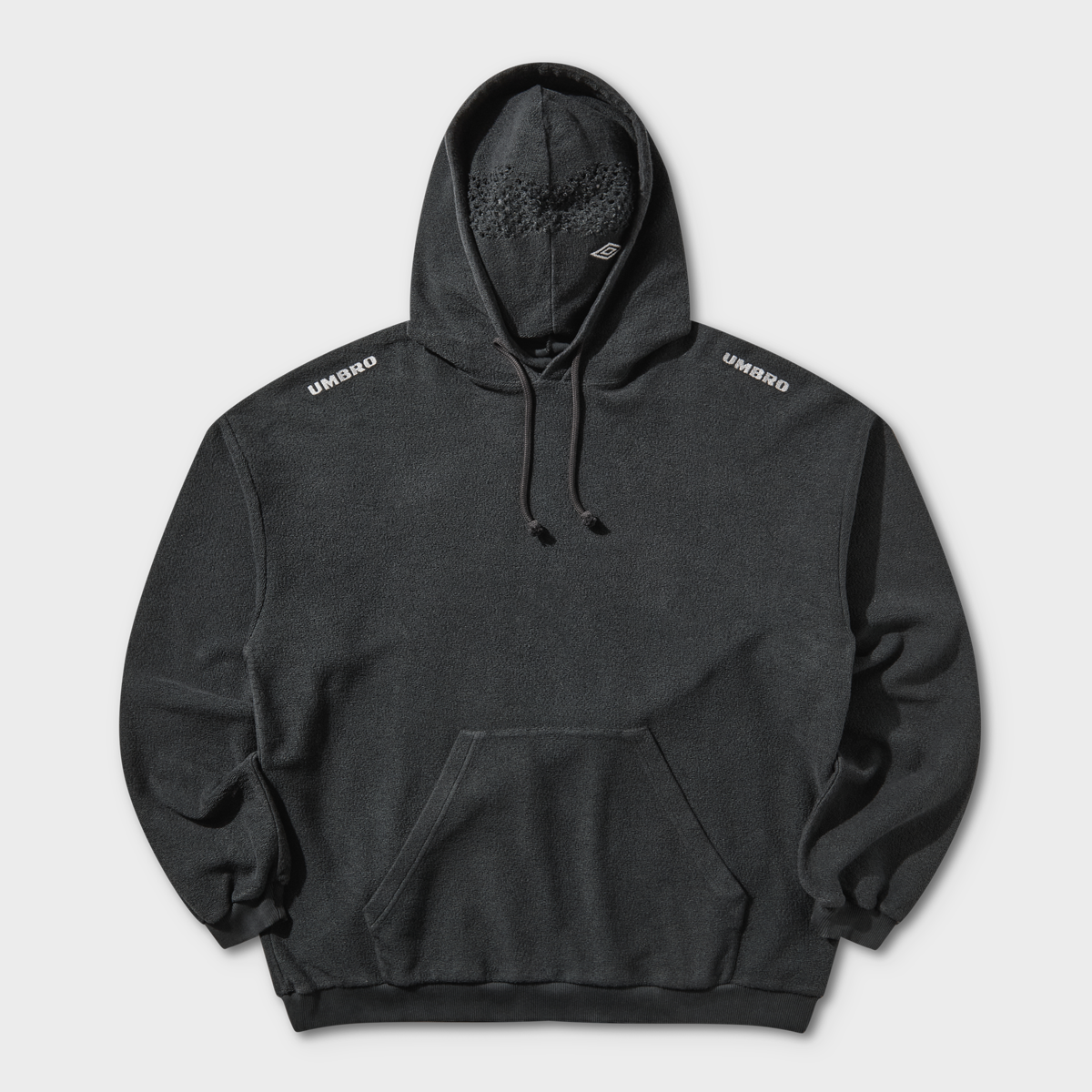 Buy Umbro by Slam Jam Lasered Masked Hoodie in black