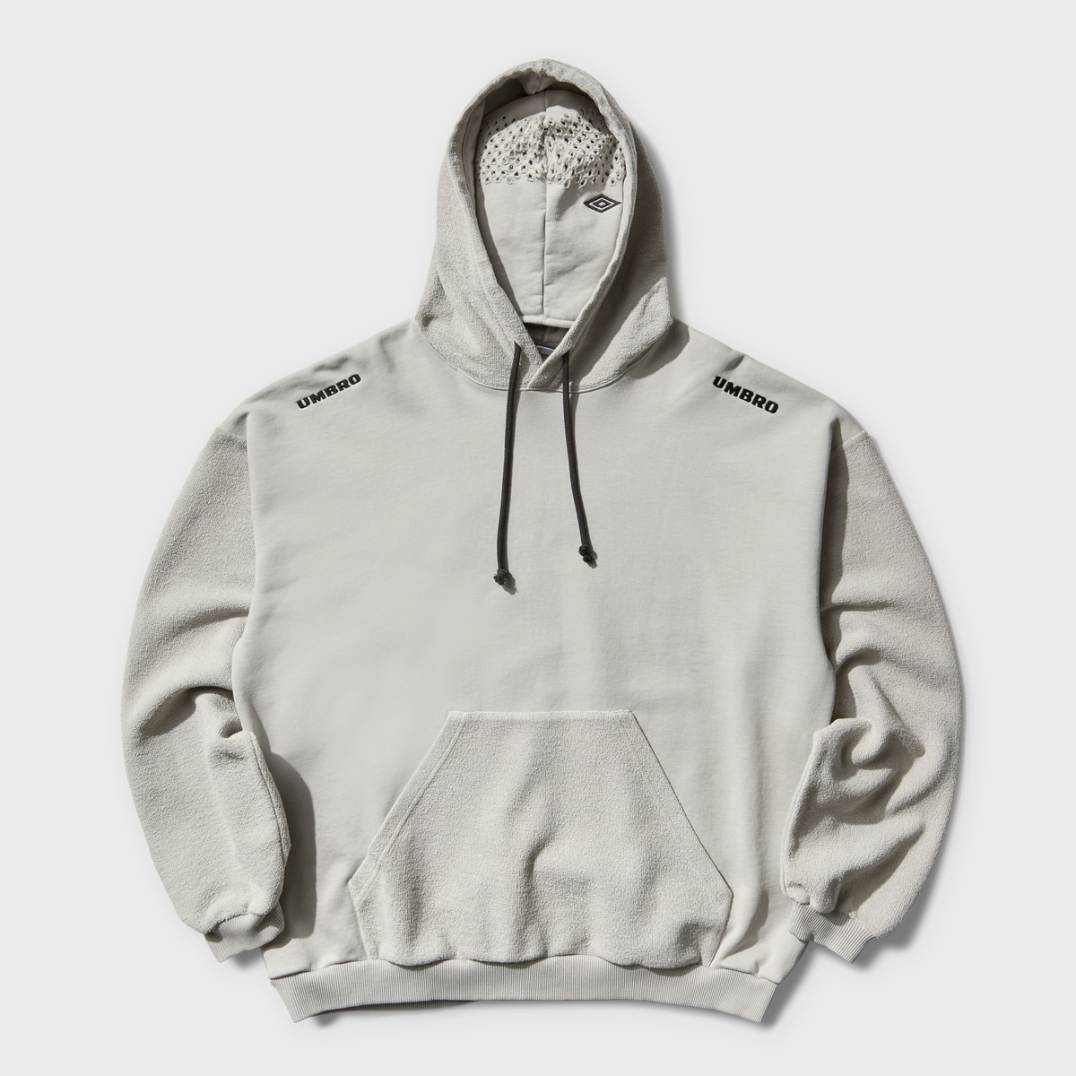 Buy Umbro by Slam Jam Lasered Masked Hoodie in grey
