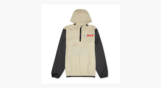 Buy Comme des Garcons Play K-Way Half Zip Jacket in beige | P1J506