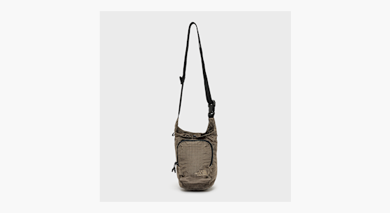 Buy The North Face Never Stop Bucket Bag in beige | NF0A8JCD2H91
