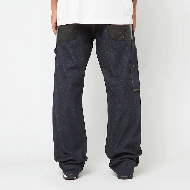 Buy Junya Watanabe MAN Pants indigo x black Pants in blue | at MBCY