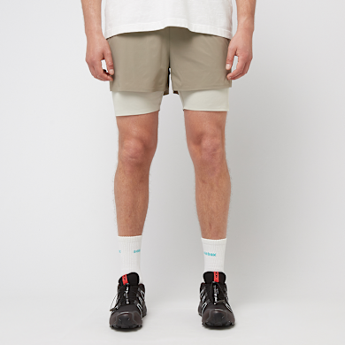 Buy PUMA MMQ Running Shorts in beige | 629354-83 | solebox
