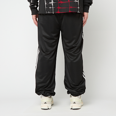 Buy adidas Originals x Thug Club Superstar Jogger Pants in zwart