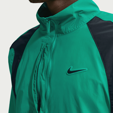 Buy Nike x Nocta NRG Woven Track Jacket in neptune green/black