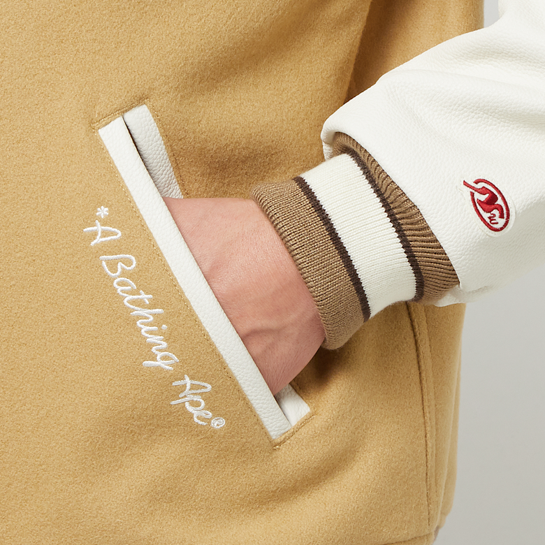 Buy A Bathing Ape Multi Motif Varsity Jacket in beige
