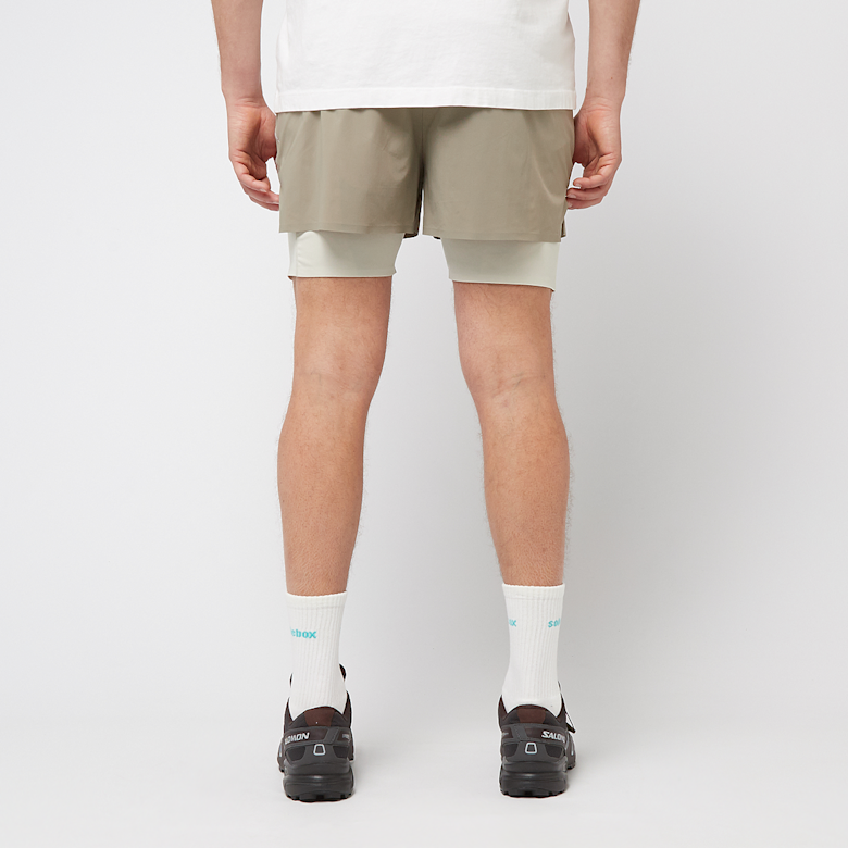 Buy PUMA MMQ Running Shorts in beige | 629354-83 | solebox