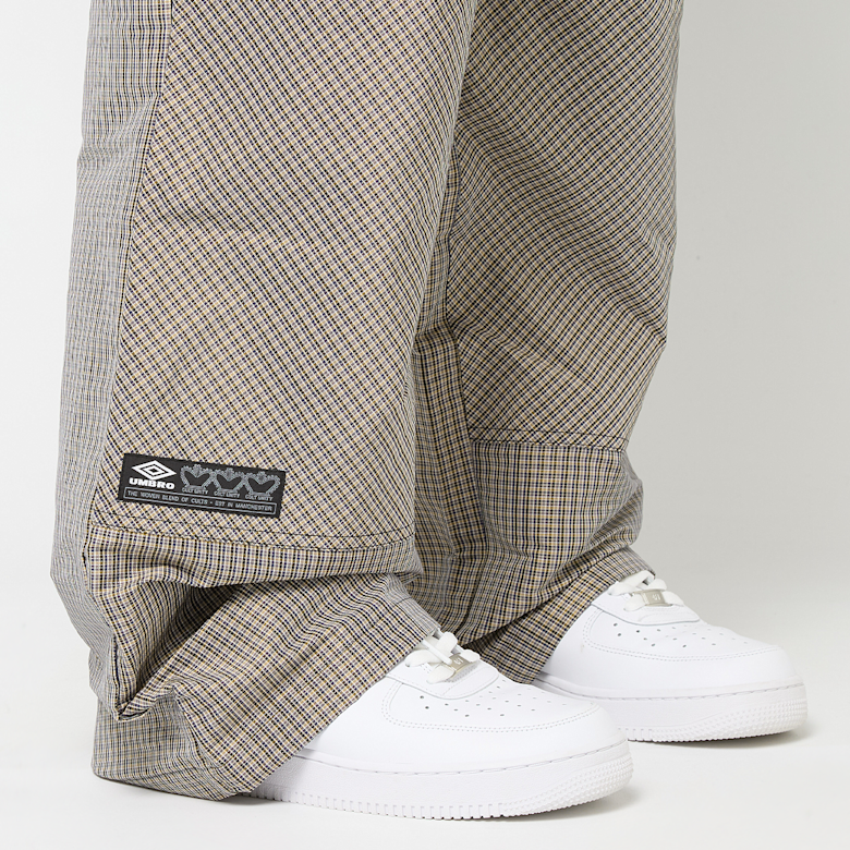 Buy Umbro by Slam Jam Check Track Pants in beige | UBMW0335FA210