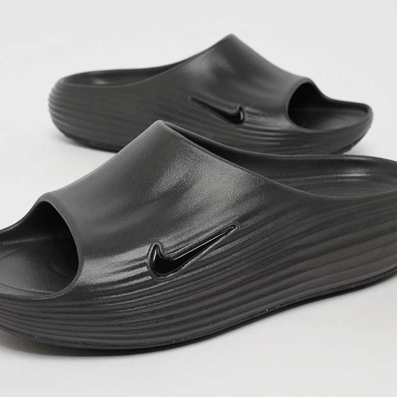 Buy Nike Reactx Rejuven8 Slide in black | HV4479-001 | solebox