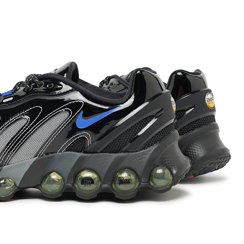 Buy Nike x Patta Air Max DN8 in black/game royal-metallic silver