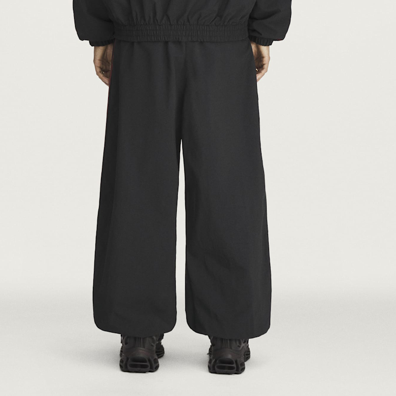 Buy adidas Originals x Willy Chavarria Woven Track Pant in black