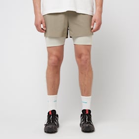PUMA MMQ Running Shorts beige