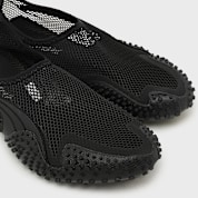 Buy PUMA Mostro Flex Mesh in black | 403214-01 | solebox