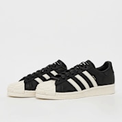 Buy adidas Originals x Willy Chavarria Superstar in black | KJ2029